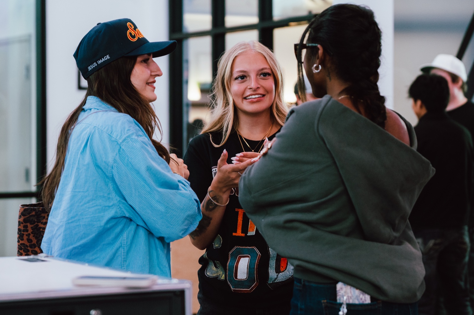 Students connecting in conversation after a gathering